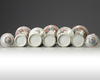 A Chinese famille rose five-piece garniture