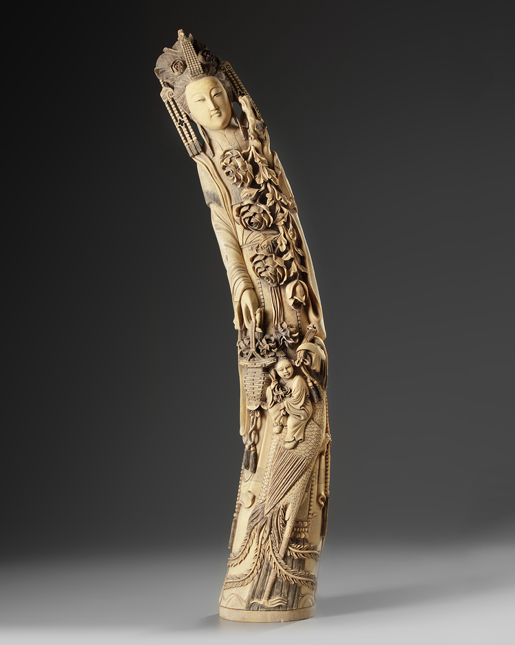 A Chinese ivory figure of Guanyin 