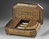 A Chinese export gilt lacquered games box