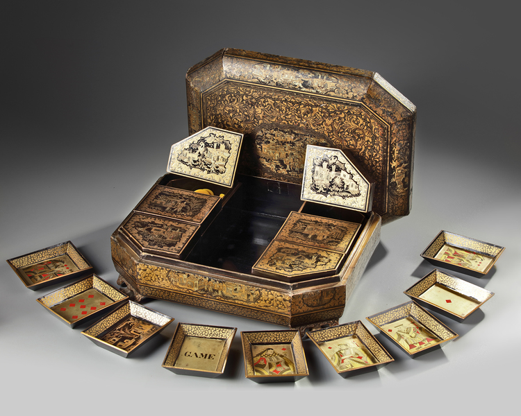 A Chinese export gilt lacquered games box