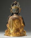 A Chinese gilt lacquered bronze figure of Guanyin