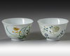 A pair of small Chinese famille rose bowls