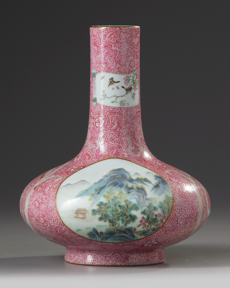 A Chinese pink-ground famille rose bottle vase