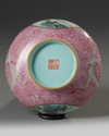 A Chinese pink-ground famille rose bottle vase