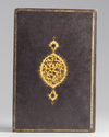 An Islamic composition of Islamic calligraphy bound in a book