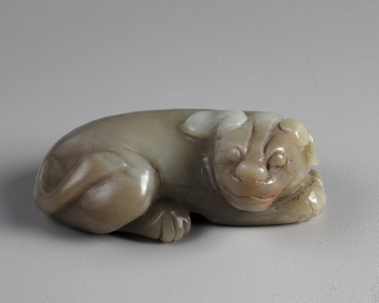 A Chinese celadon jade mythical beast