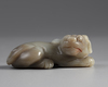 A Chinese celadon jade mythical beast