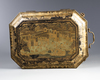 A Chinese gilt and black lacquered box and cover