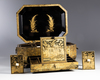 A Chinese gilt and black lacquered box and cover