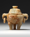 A CHINESE RUSSET JADE TRIPOD CENSER AND COVER 