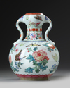A Chinese famille rose butterfly double gourd vase