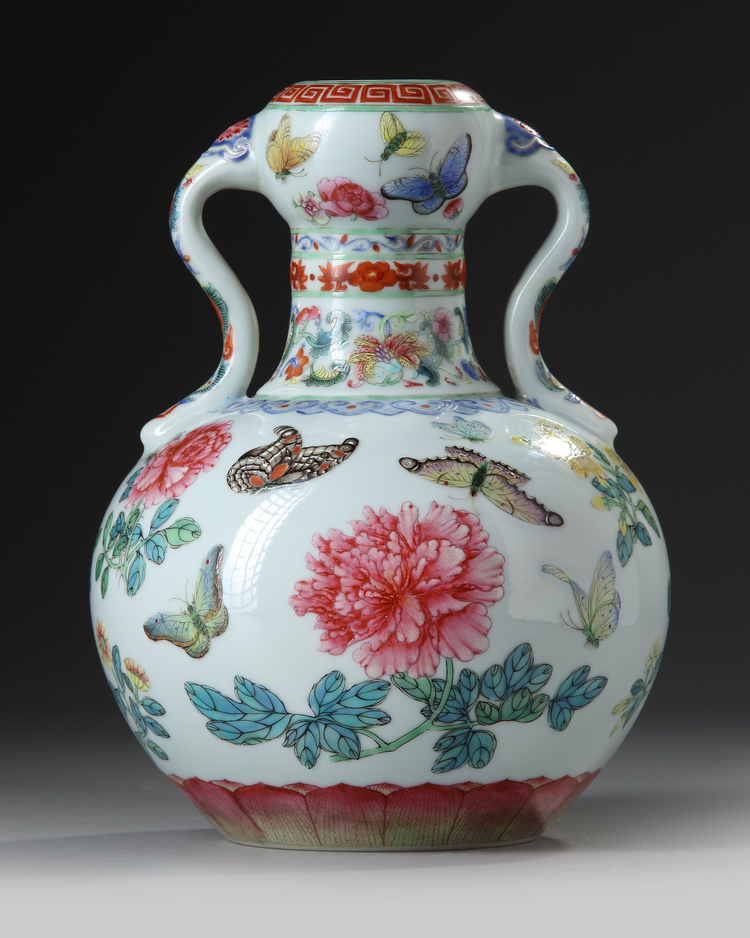 A Chinese famille rose butterfly double gourd vase