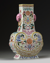 A Chinese famille rose ruyi moulded vase