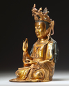 A  Chinese gilt-bronze figure of Avalokitesvara