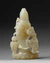 A CHINESE PALE JADE CARVING OG GUANYIN AND A BOY