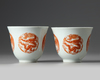 Two large Chinese dragon and phoenix cups