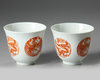 Two large Chinese dragon and phoenix cups