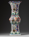 A CHINESE WUCAI 'DRAGON AND PHOENIX' GU VASE, QING DYNASTY (1644-1911)