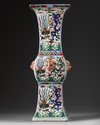 A CHINESE WUCAI 'DRAGON AND PHOENIX' GU VASE, QING DYNASTY (1644-1911)