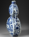 A Chinese blue and white double gourd moon flask