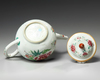A Chinese famille rose teapot and cover