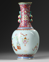 A Chinese famille rose precious objects vase