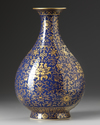 A gilt Chinese  pear shaped blue vase