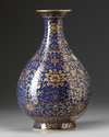 A gilt Chinese  pear shaped blue vase