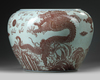 A LARGE CHINESE UNDERGLAZE RED DRAGON JARDINIERE,19TH-20TH CENTURY