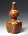 A Chinese coral red ground double gourd vase