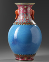 A CHINESE ROBINS-EGG AND FAMILLE-ROSE REVOLVING VASE, QING DYNASTY (1644-1911)