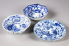 A GROUP OF THREE JAPANESE BLUE AND WHITE DISHES