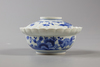 A JAPANESE KAKIEMON BOWL AND COVER