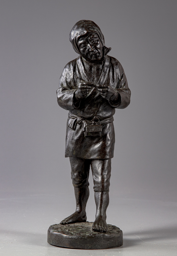A JAPANESE BRONZE FIGURE HOLDING A PIPE, MEIJI PERIOD (1868-1912)