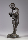 A JAPANESE BRONZE FIGURE HOLDING A PIPE, MEIJI PERIOD (1868-1912)
