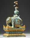 A CHINESE JADE AND CLOISONNÉ CAPARISONED ELEPHANT ON A CLOISONNÉ BASE, QING DYNASTY (1644-1911)