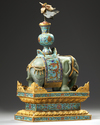 A CHINESE JADE AND CLOISONNÉ CAPARISONED ELEPHANT ON A CLOISONNÉ BASE, QING DYNASTY (1644-1911)