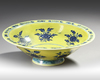 A RARE CHINESE MING-STYLE BLUE AND WHITE YELLOW-GROUND CONICAL BOWL