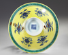 A RARE CHINESE MING-STYLE BLUE AND WHITE YELLOW-GROUND CONICAL BOWL