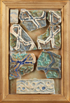A GROUP OF ILKHANID LUSTRE POTTERY TILE FRAGMENTS
