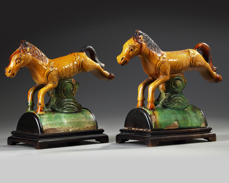 A PAIR OF CHINESE SPINACH-AND-EGG GLAZED POTTERY TILEWORK HORSES