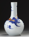 A CHINESE BLUE AND WHITE IRON-RED DECORATED 'DRAGON' BOTTLE VASE