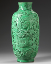 A CHINESE MOLDED GREEN GLAZED 'DRAGON' VASE