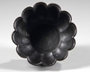 A MUGHAL BLACK GLAZED LOTUS SHAPED CERAMIC BOWL