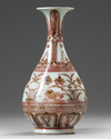 A CHINESE UNDERGLAZE COPPER-RED 'MANDARIN DUCKS' PEAR SHAPED VASE
