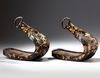 A SET OF TWO BLACK LACQUERED JAPANESE STIRRUPS (ABUMI)