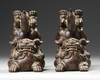 A PAIR OF CHINESE YIXING STONEWARE JUMPING BUDDHIST LIONS