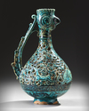 A RARE FRITWARE OPENWORK DECORATED RETICULATED EWER WITH ROOSTER HEAD, PERSIA, 13TH CENTURY