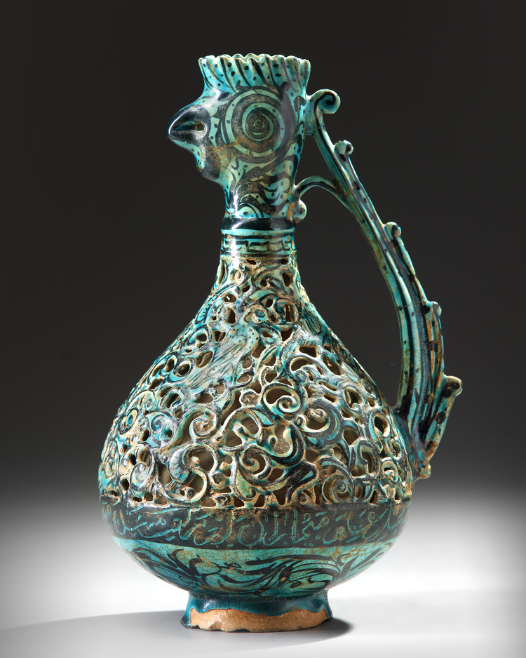 A RARE FRITWARE OPENWORK DECORATED RETICULATED EWER WITH ROOSTER HEAD ...