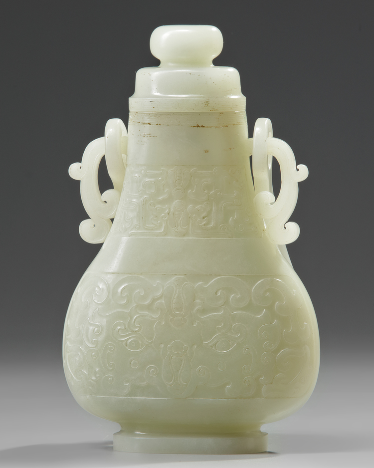 A CHINESE PALE JADE HANGING VASE WITH COVER AND HARDWOOD STAND